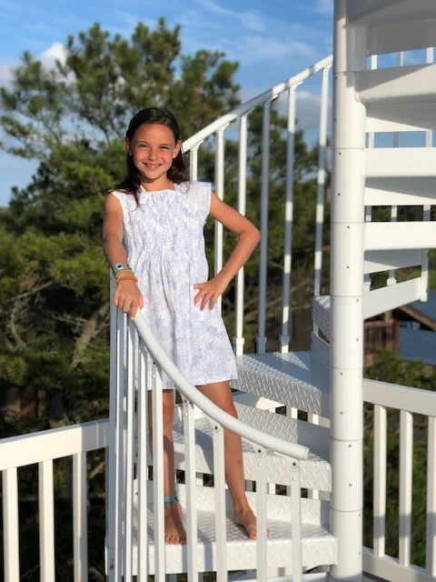 The Cloey Smocked Dress in Blue and White Palm Print